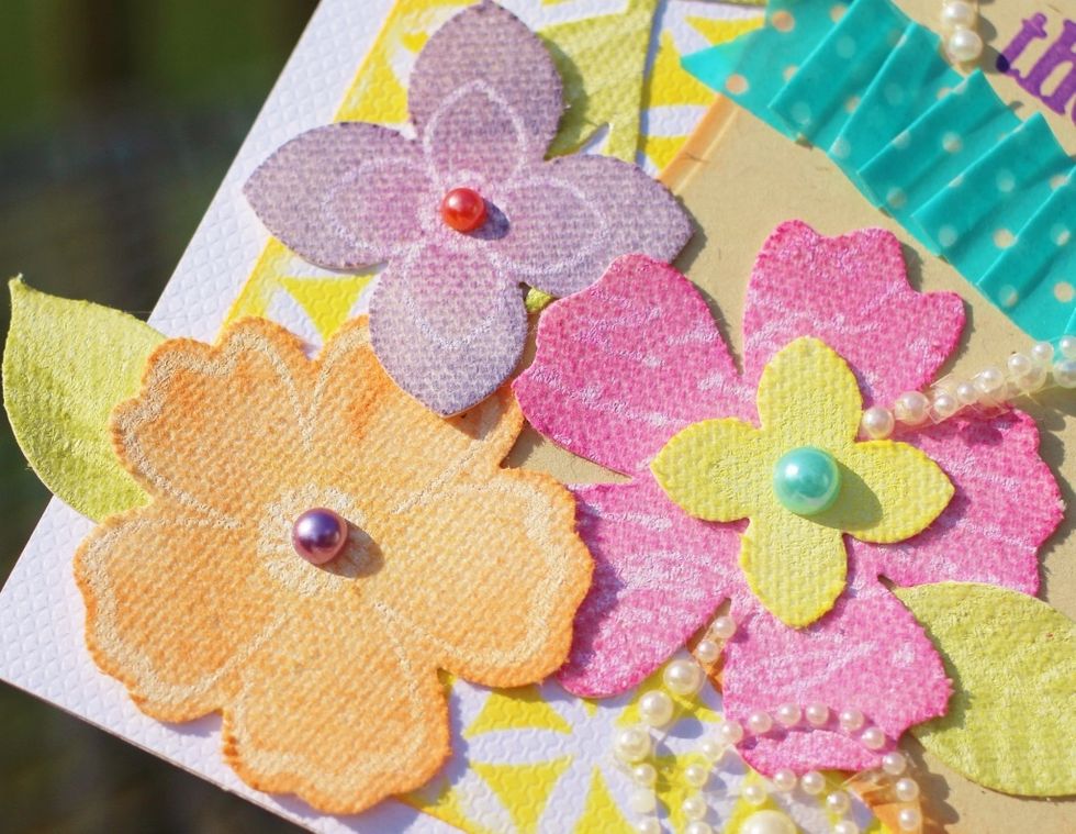 use your choice of inks, applied using Stylus & Tips, to tint canvas flowers. use a paper towel to gently remove any excess ink to expose embossed areas.