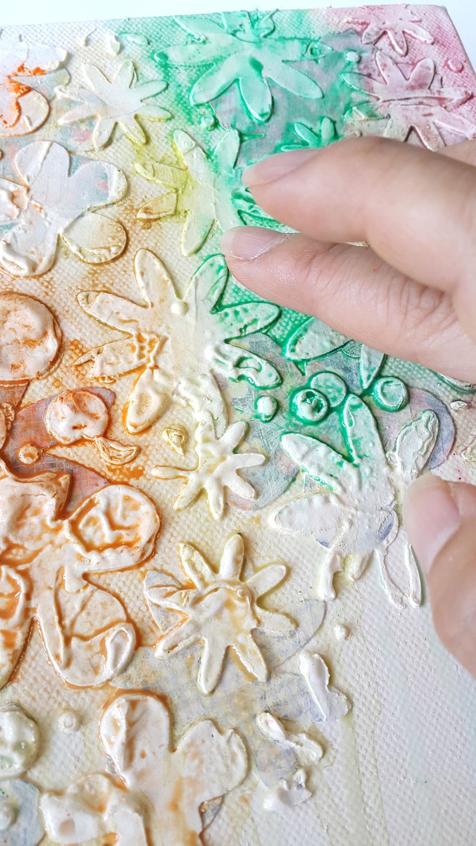 Use your finger to spread out the rest of the Gelatos colors and let the colors to be blend together, leave to dry or heat tool to dry