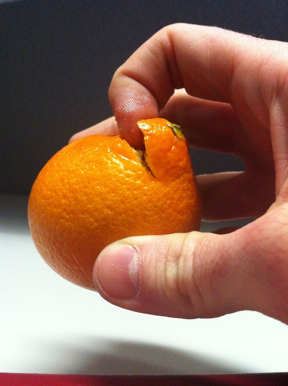 Use your fingernail to pry into the rind