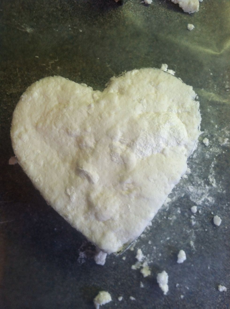 Use your fingers to fill the cookie cutter with the soap mixture.... I used this heart shaped one! :)