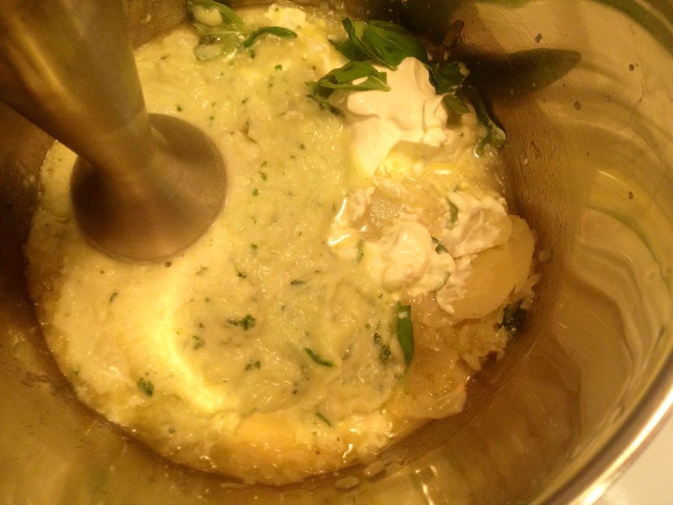 Use your hand mixer to blend the ingredients.