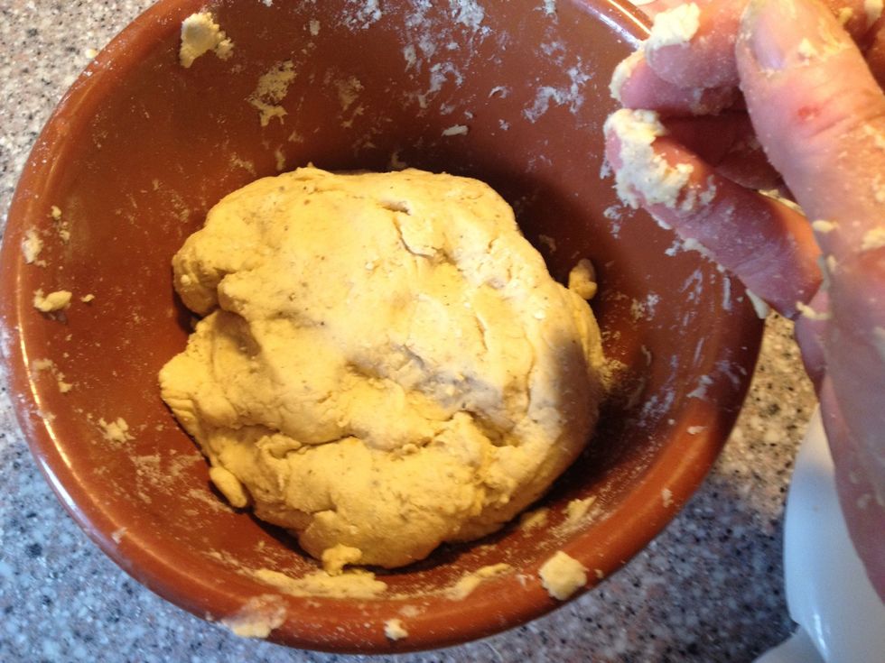 Use your hand to combine dough, don't over work dough, you don't want gluten to form , you want the scones to be crumbly, not chewy