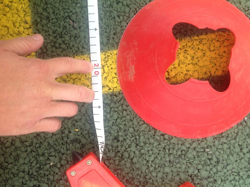 Use your measuring tape to ensure you have measured 20m exactly and place your cones at either end.