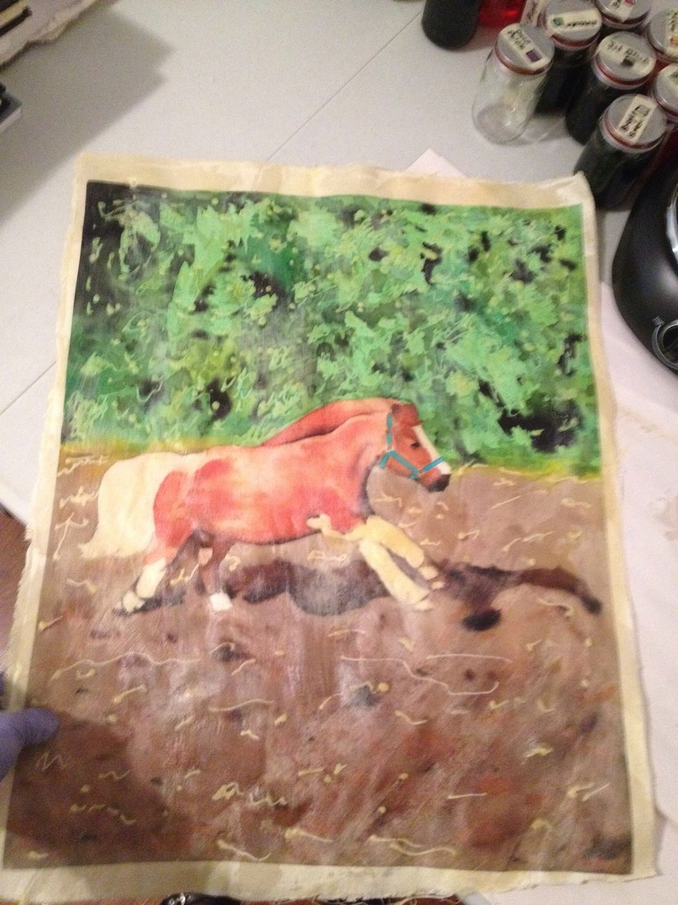 Use your natural brush and dip it in the wax. Paint the wax on the entire piece front and back! Make sure the wax is hot enough to soak into the fabric this is important!