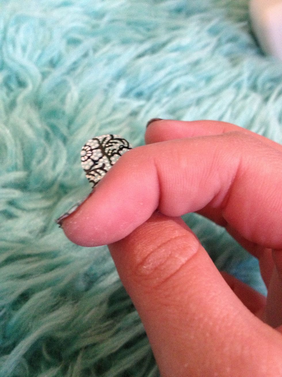 Use your other finger to press it down