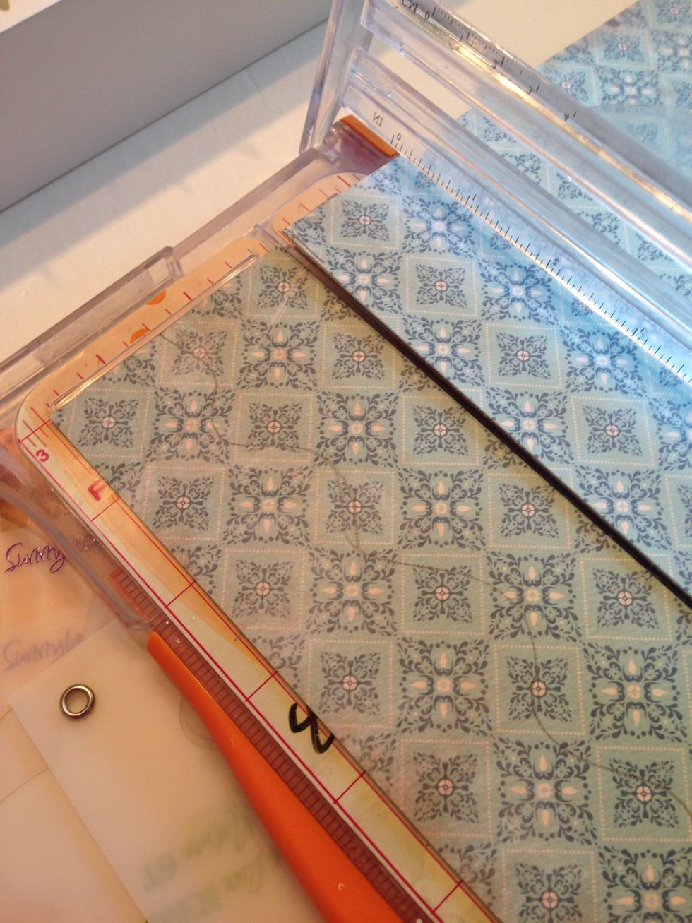 Use your paper trimmer to make a straight cut where you made the mark.