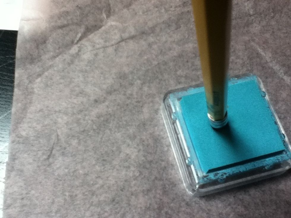 Use your pencil's eraser as a stamp. Stamp it in the ink...