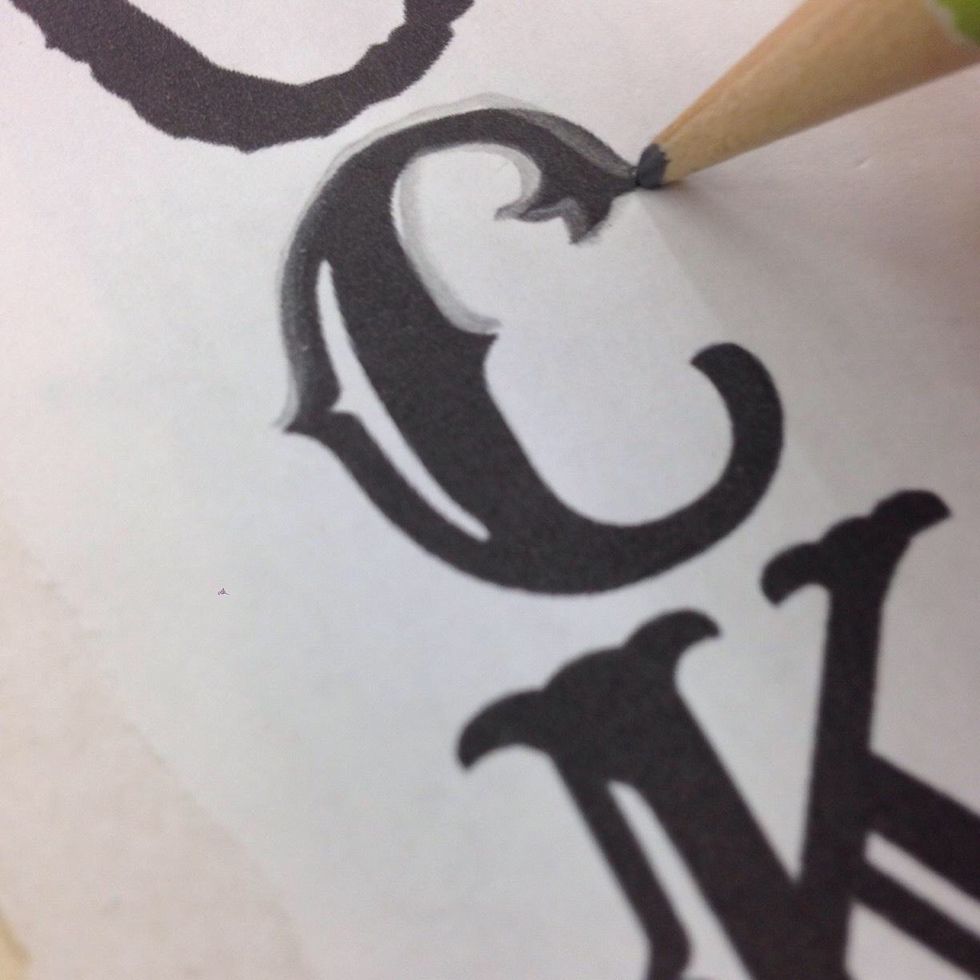 Use your pencil to trace around the outside edges of the letters. It's helpful to wait and add the white highlight sections later.