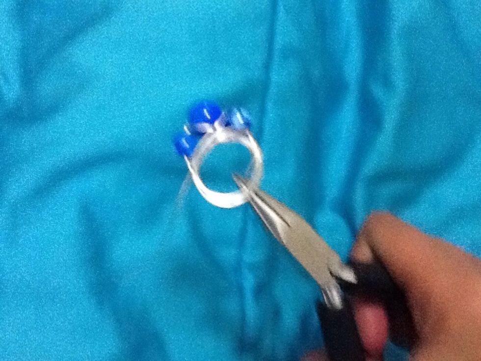 Use your pliers to tighten the coils