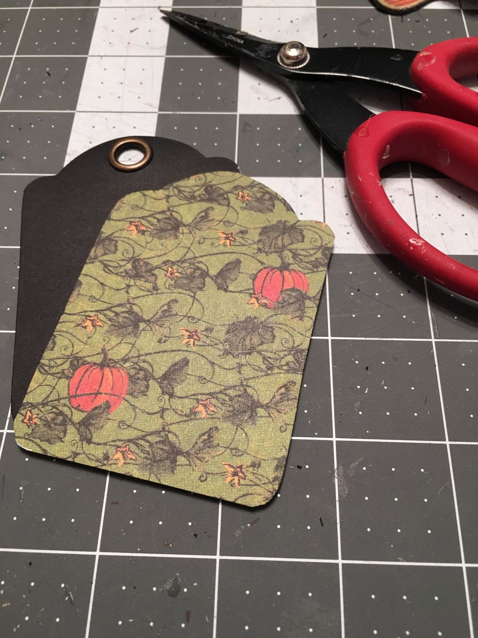 Use your scissors to cut the patterned paper out.