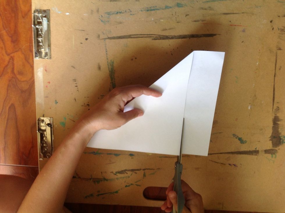 Use your scissors to trim off the extra rectangle of paper.