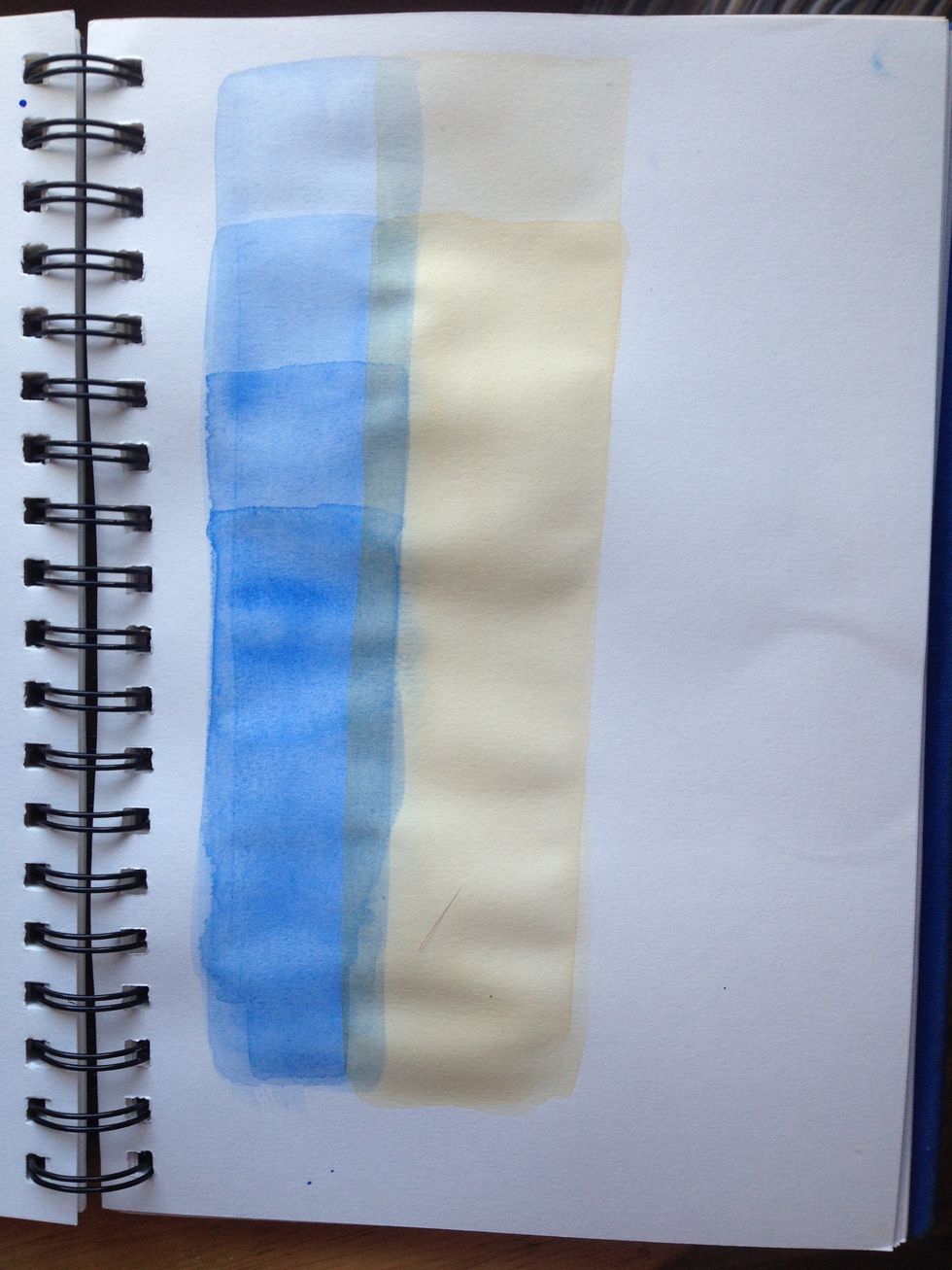 Use your sienna to create a new strip that also overlaps the blue. You now have the sienna plus a unique color where it overlaps each blue. These colors can't be made by mixing in the palate.