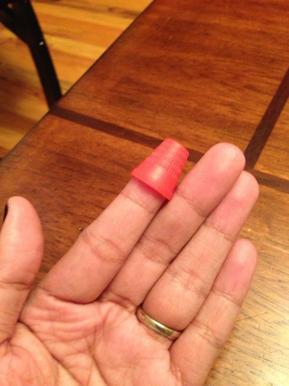 Use your thimble to protect your finger while stitching.