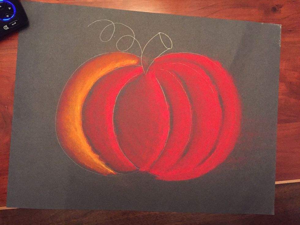 Use your tissue to blend into each section of your pumpkin. Leave a little black in each section.