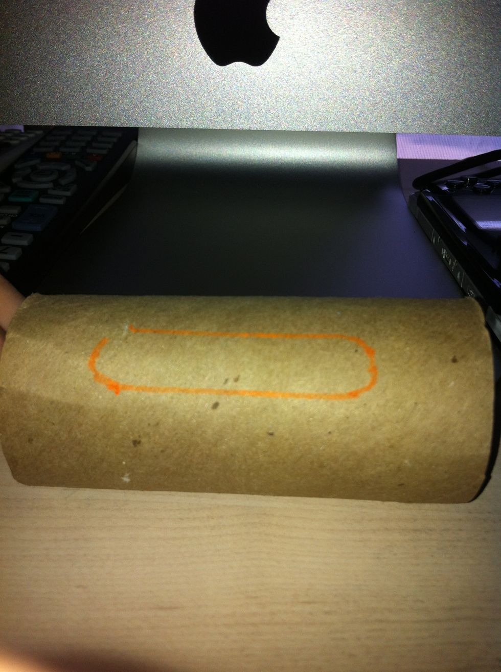 Use your writing utensil to outline your device. Be careful to not mark it up.