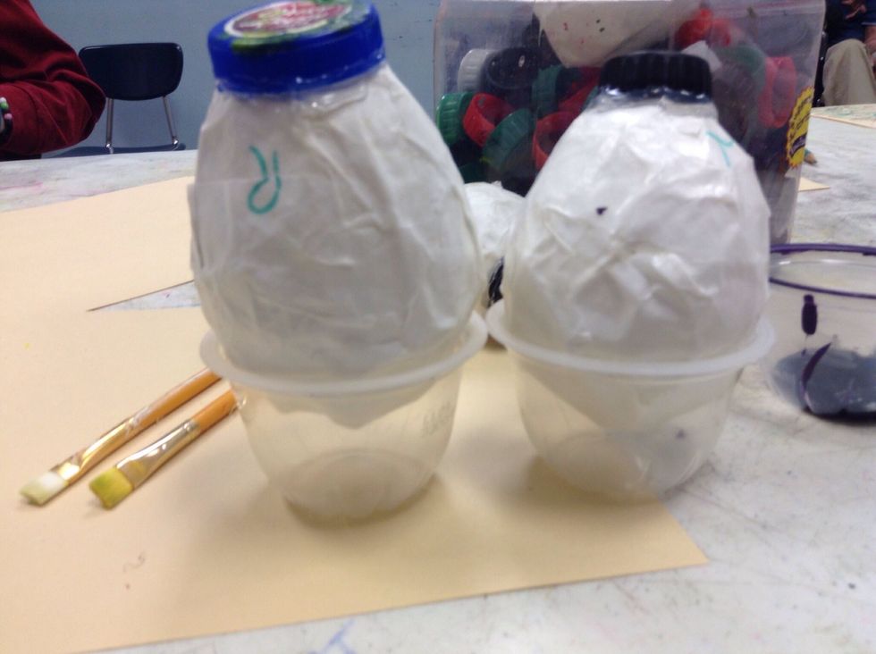 Used some saved fruit cups to hold our cute pre-spider torsos for easy and mess free painting.