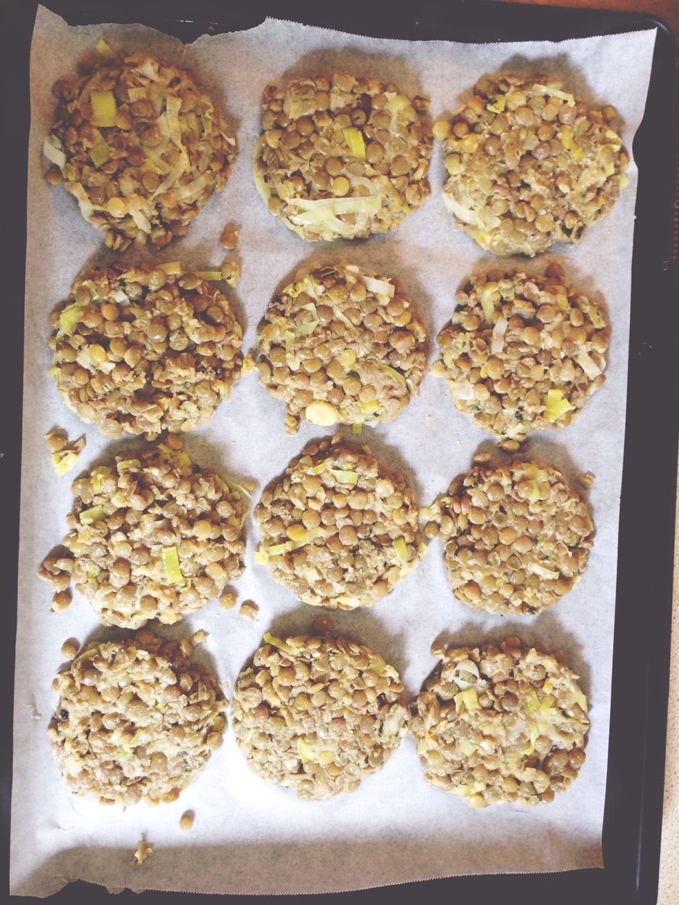 Using a 1/4 cup, scoop the lentil mixture and flatten to form patties (mixture will yield approximately 12). Place patties on a baking tray lined with baking paper and bake for 20 min at 350F (165C).