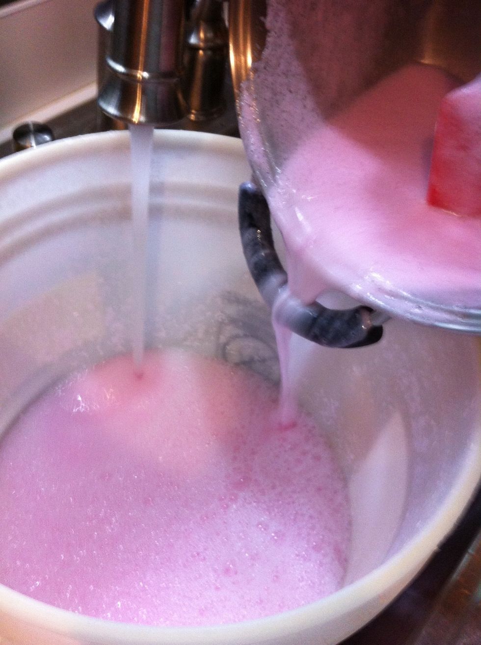 Using a 5 gallon bucket, add soap mixture and enough water to almost fill bucket. Stir to combine. Put a lid on it and allow it to sit overnight.