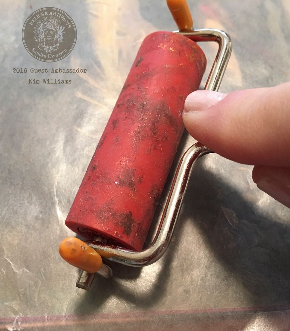 Using a beater push out any bubbles behind the image. Carefully as to not distress the image. Using a piece of wax paper on top will help protect the image during this process.