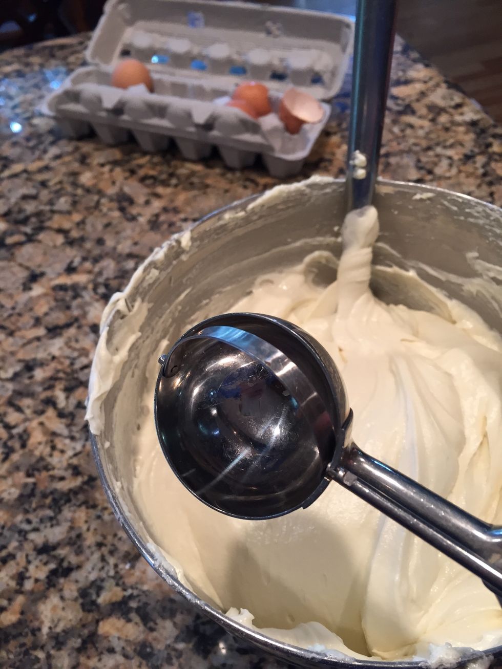 Using a big scooper, I add about four scoops per loaf pan