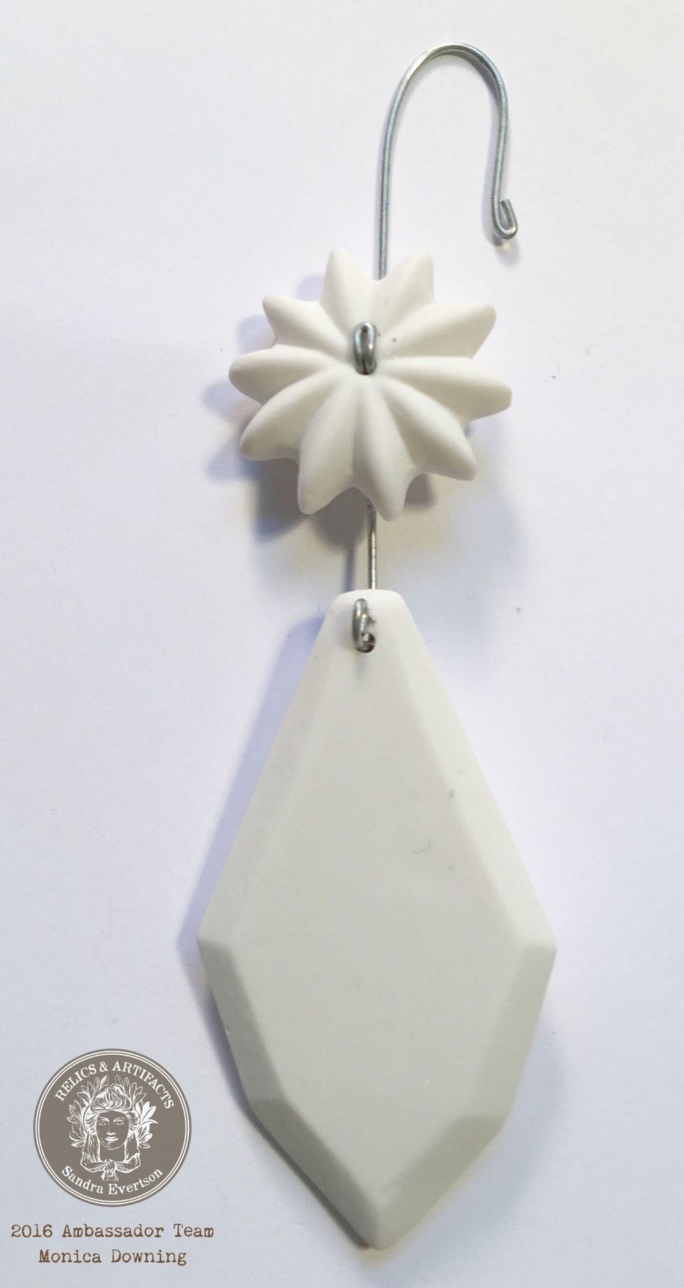 Using a Chandelier Pendant, I used one with a flower on top and flat edges, choose the paint colors you want to work with.