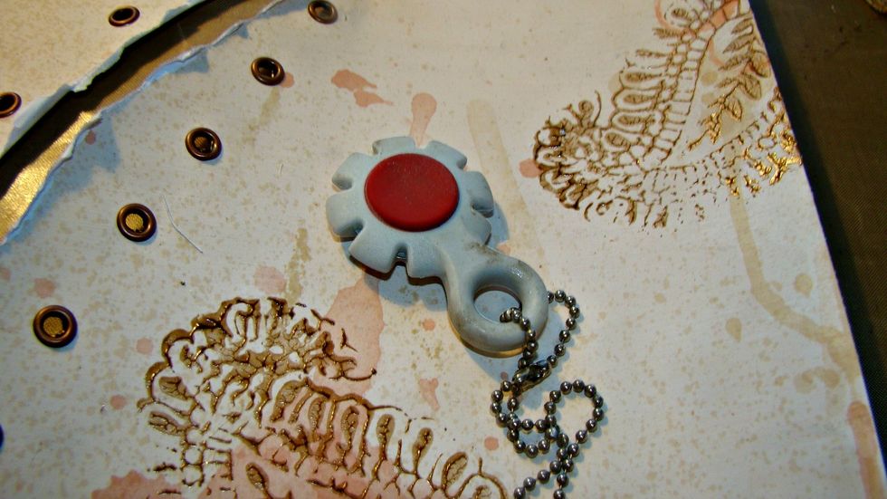 Using a distress tool or your scissors, distress the edges of your paper.