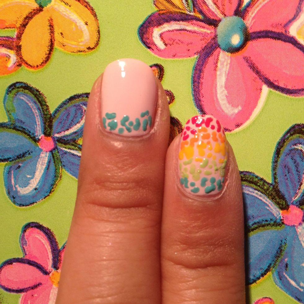 Using a dotting, create blue leopard prints near your cuticle. Do inward facing "c", and occasionally place a dot in the middle.
