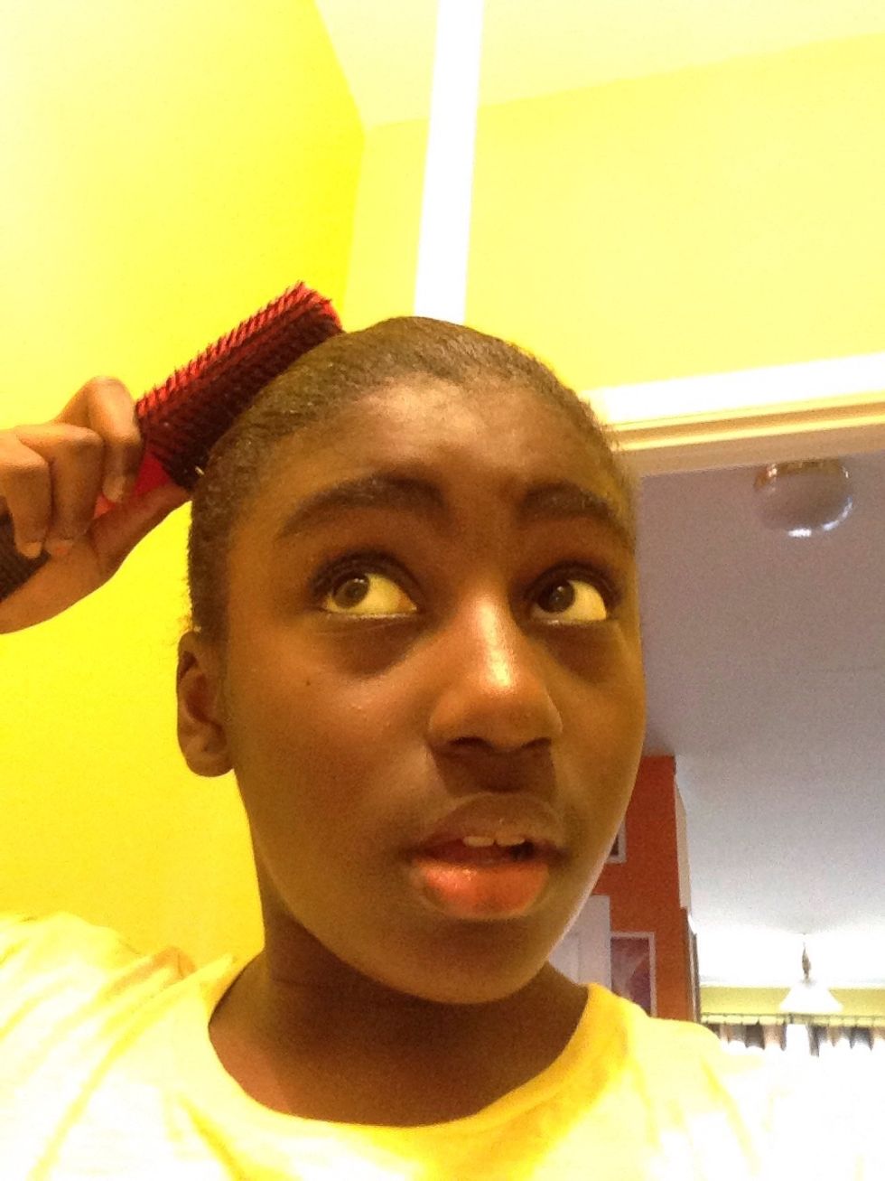 Using a edge brush- carefully brush any unwanted hair sticking out.