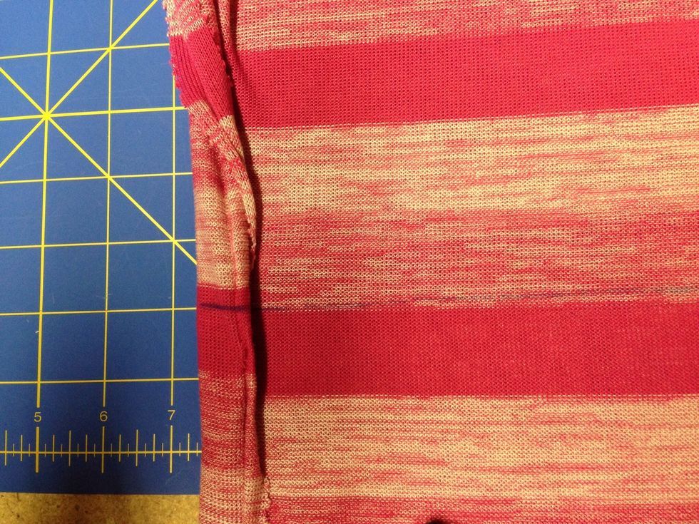 Using a fabric pen/pencil or chalk draw a straight line all the way around. Fold over sides and continue the line so it's even front and back.