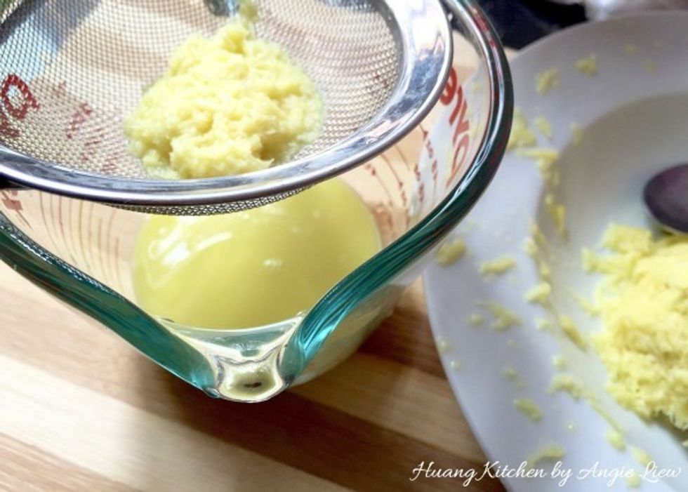 Using a fine mesh strainer set over a bowl or jar, strain the ginger juice into the container. And we're done with the juice!