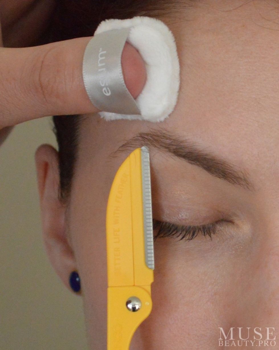Using a Flamingo Razor carefully lay the blade flat against the skin and with smooth strokes remove hair from under the brow to help shape the arch.
