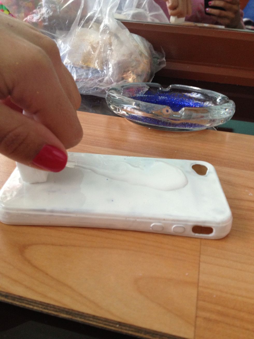 Using a foam brush, apply a thin coat of glue to the entire piece.