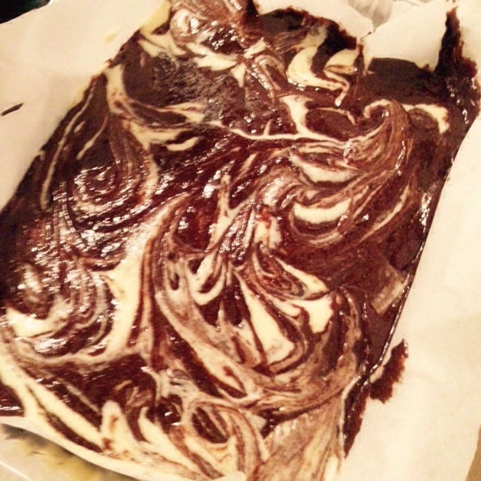 Using a fork mix the two creating swirls, don't get too excited or you will end up blending them.