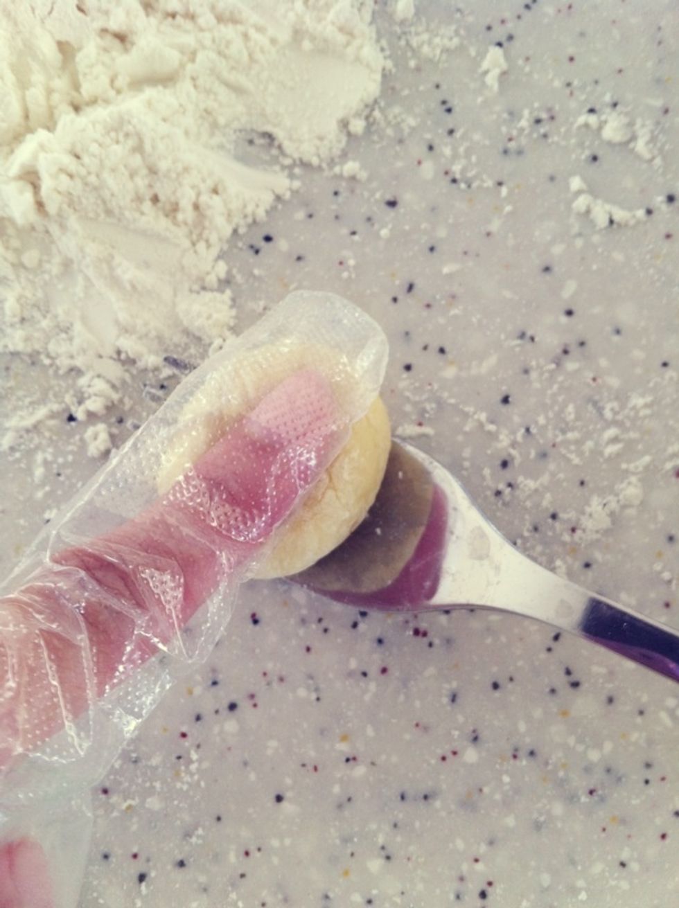 Using a fork, press & roll the ball onto the fork.