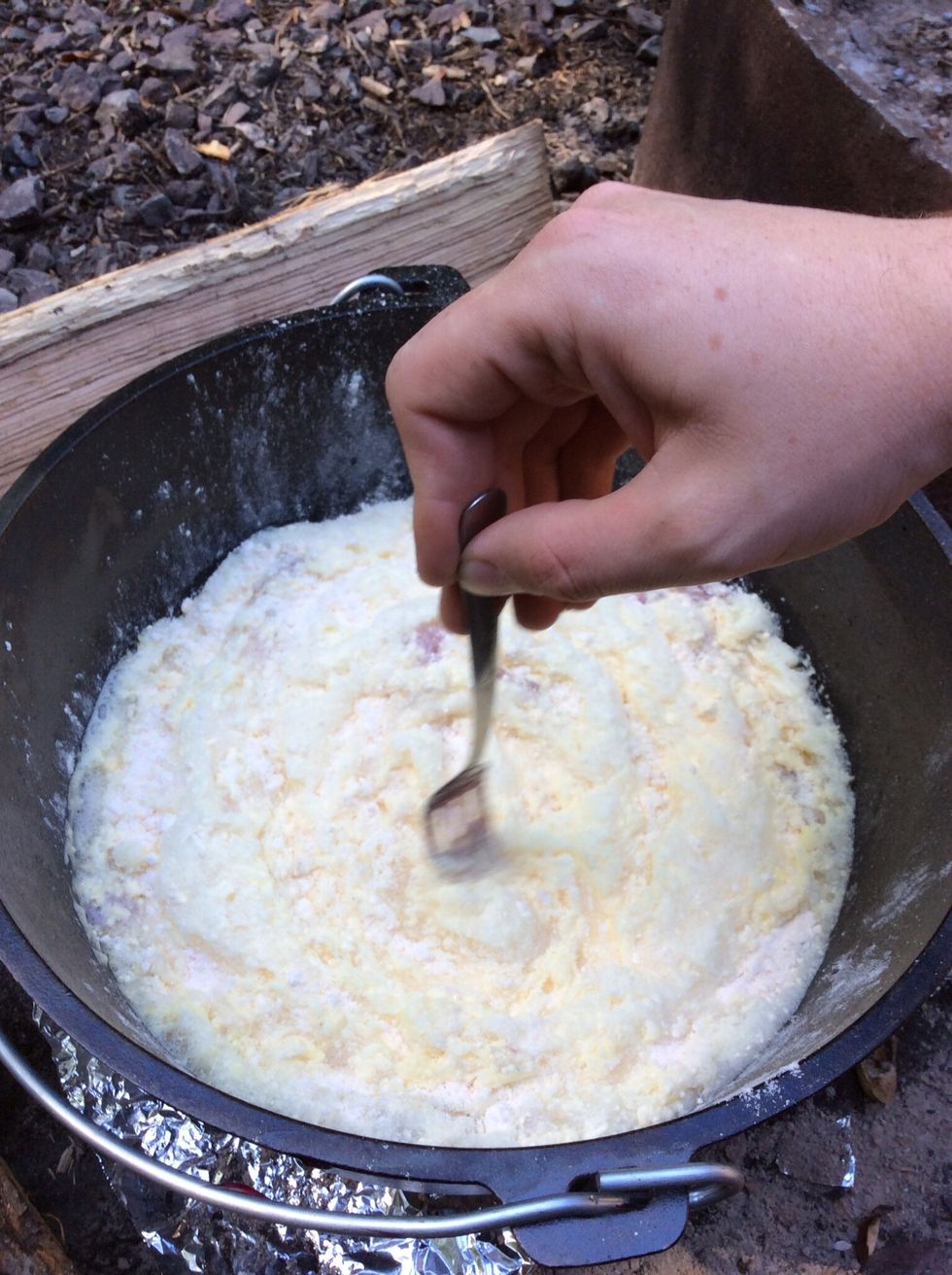 Using a fork, stir the crumbs and the soda lightly, being careful not to stir in the fruit.