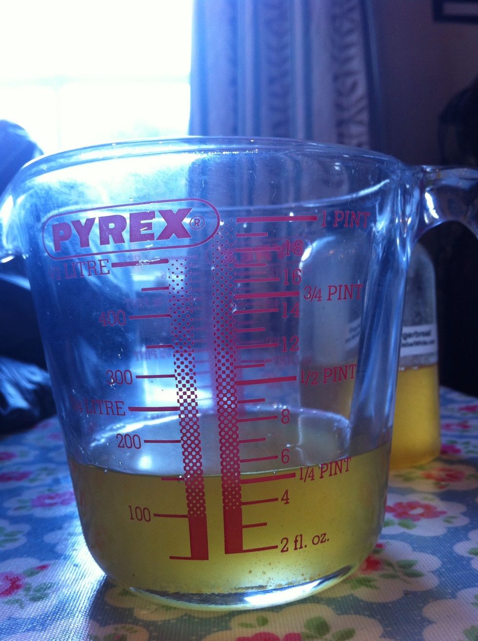 Using a glass measure pour 1oz of the flavouring oil for every 3lb of beans. It is best to use freshly roasted coffee beans but I just warmed the beans in the oven whilst I measured out the oil.