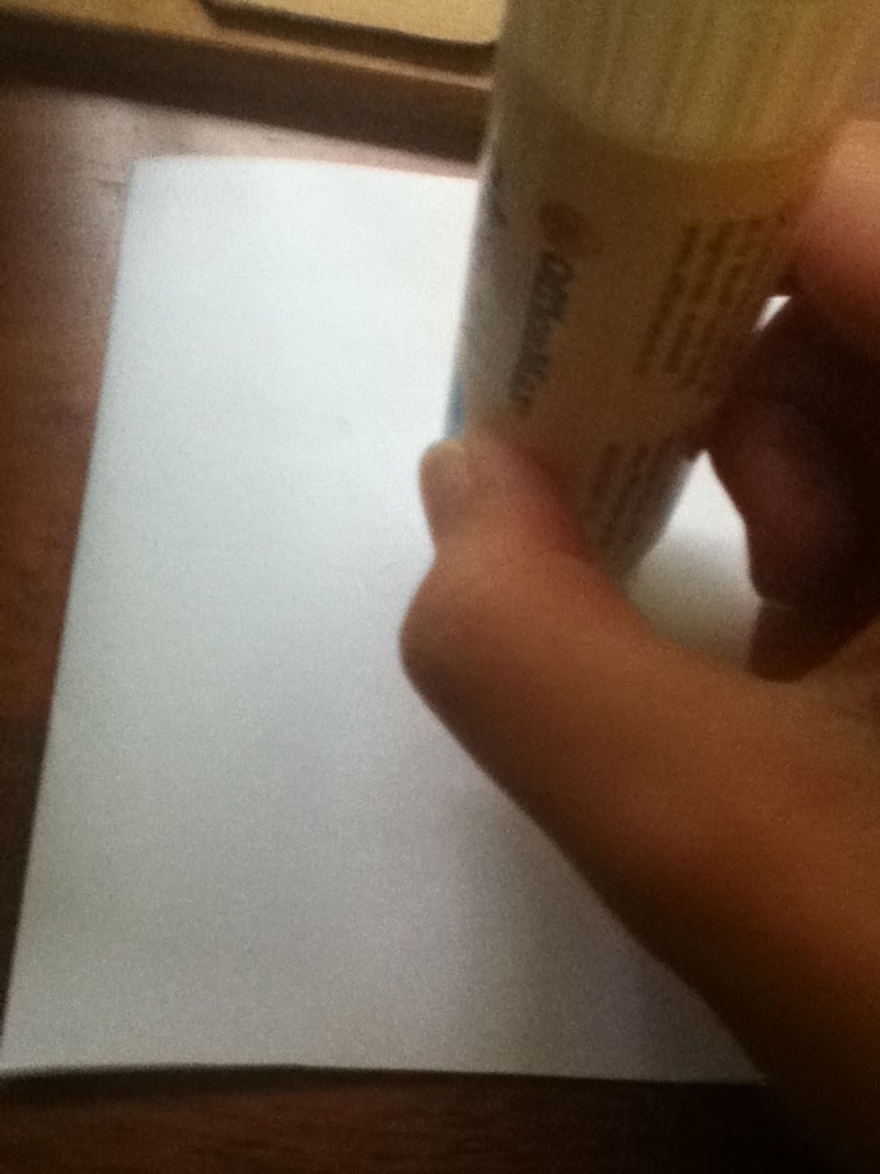 Using a good-quality glue stick, rub glue where the heads will go.