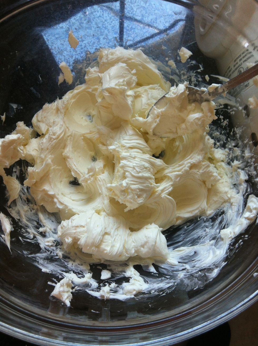 Using a hand beater, beat room temperature cream cheese until fluffy.
