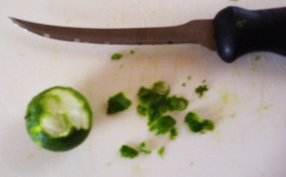 Using a knife or a potato peeler, slice small strips with a scraping motion. Again, be careful not to remove the bitter, white pith.