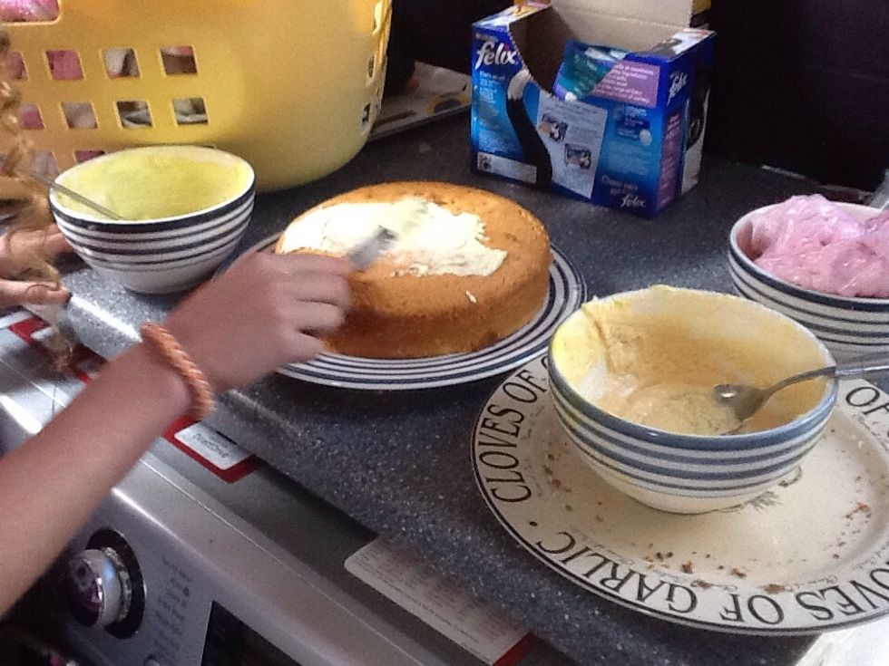 Using a knife spread around the icing