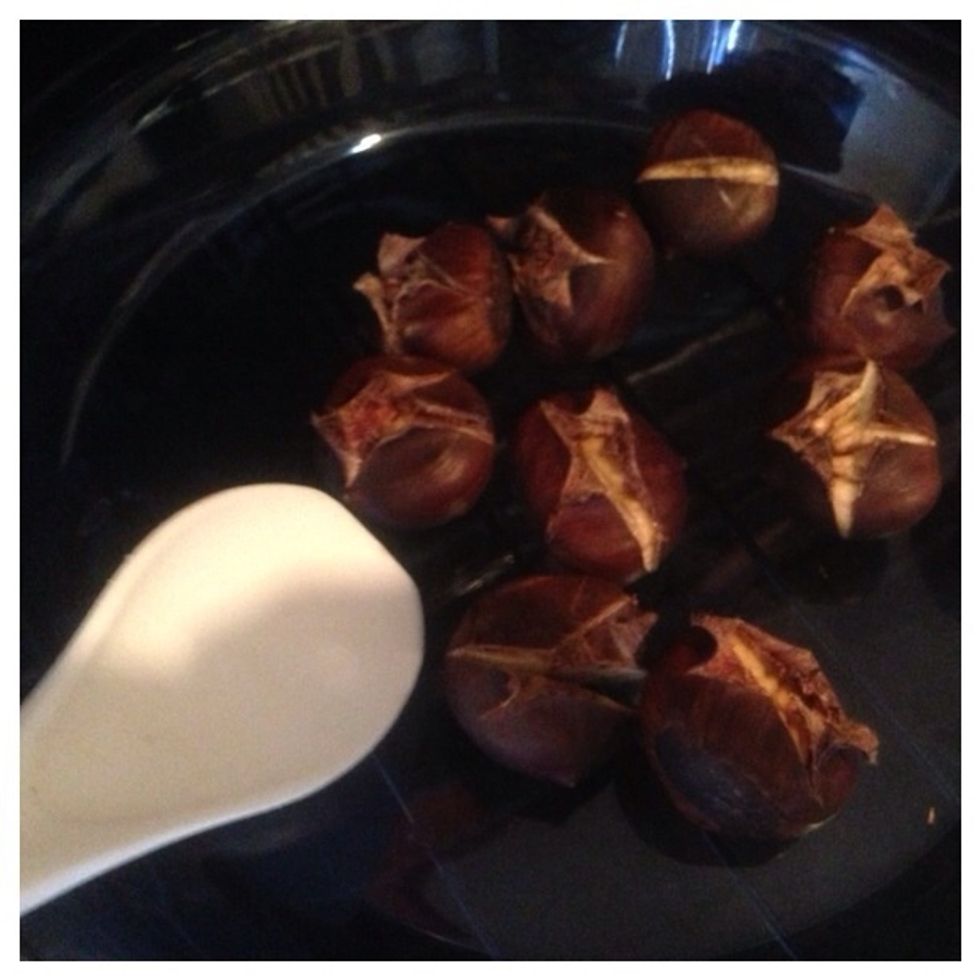 Using a large spoon or spatula, while they're roasting, move them around every few minutes to roast evenly and so they don't burn.