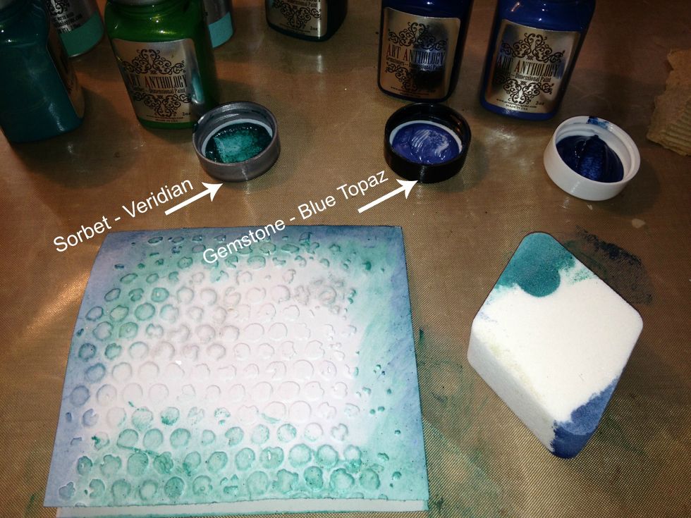 Using a makeup sponge I applied my paints to the edges of the card... You can add more or less as you desire.