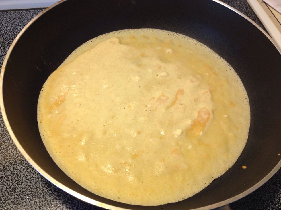 Using a measuring cup or a ladle, pour the batter in the center of the pan and quickly swirl the pan to get a round crepe ;)