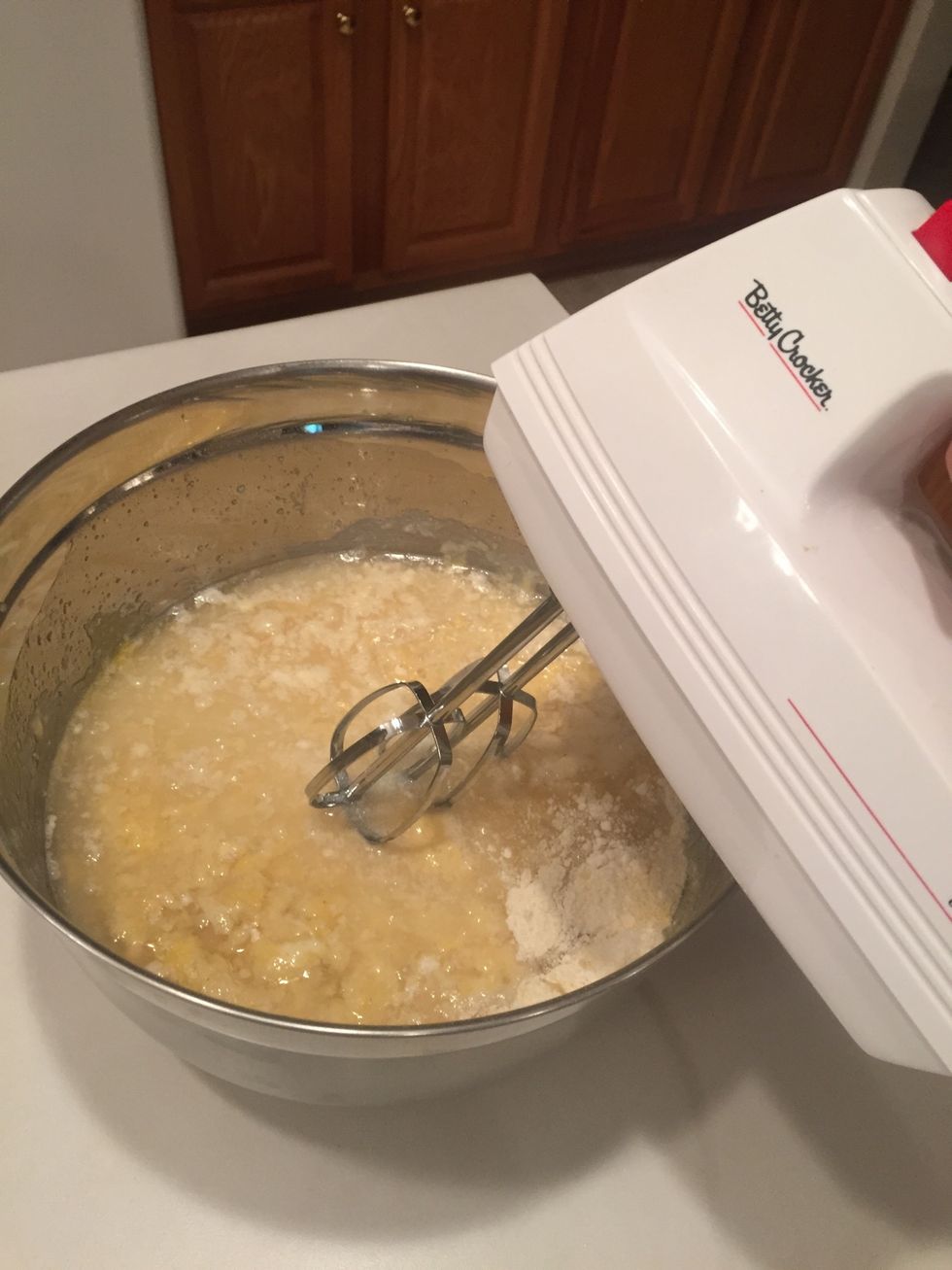 Using a mixer, mix on medium speed for 2 minutes. You can do this step by hand, too, just mix vigorously with a whisk the entire time.