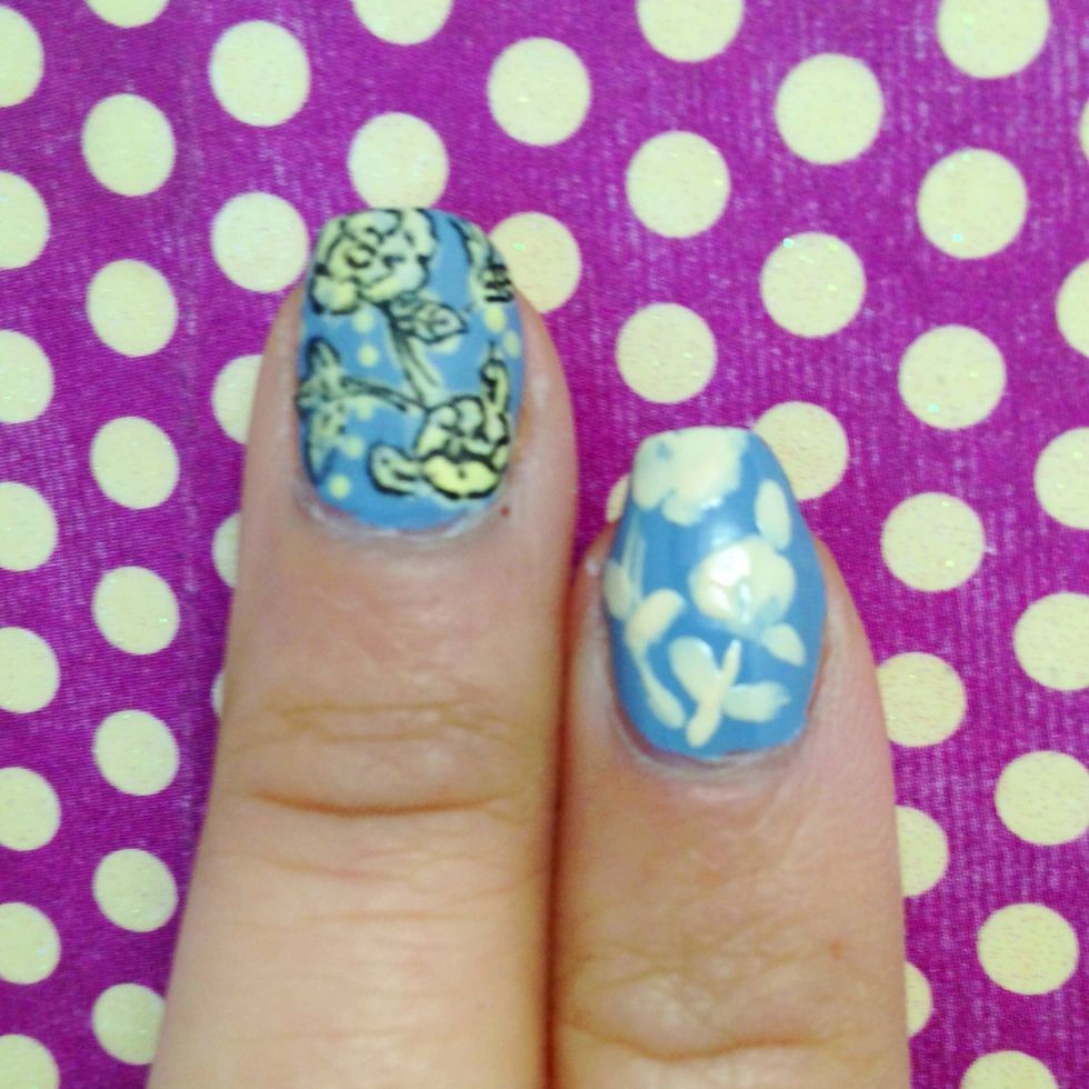 Using a nail art brush, paint the body of the flower in pale yellow