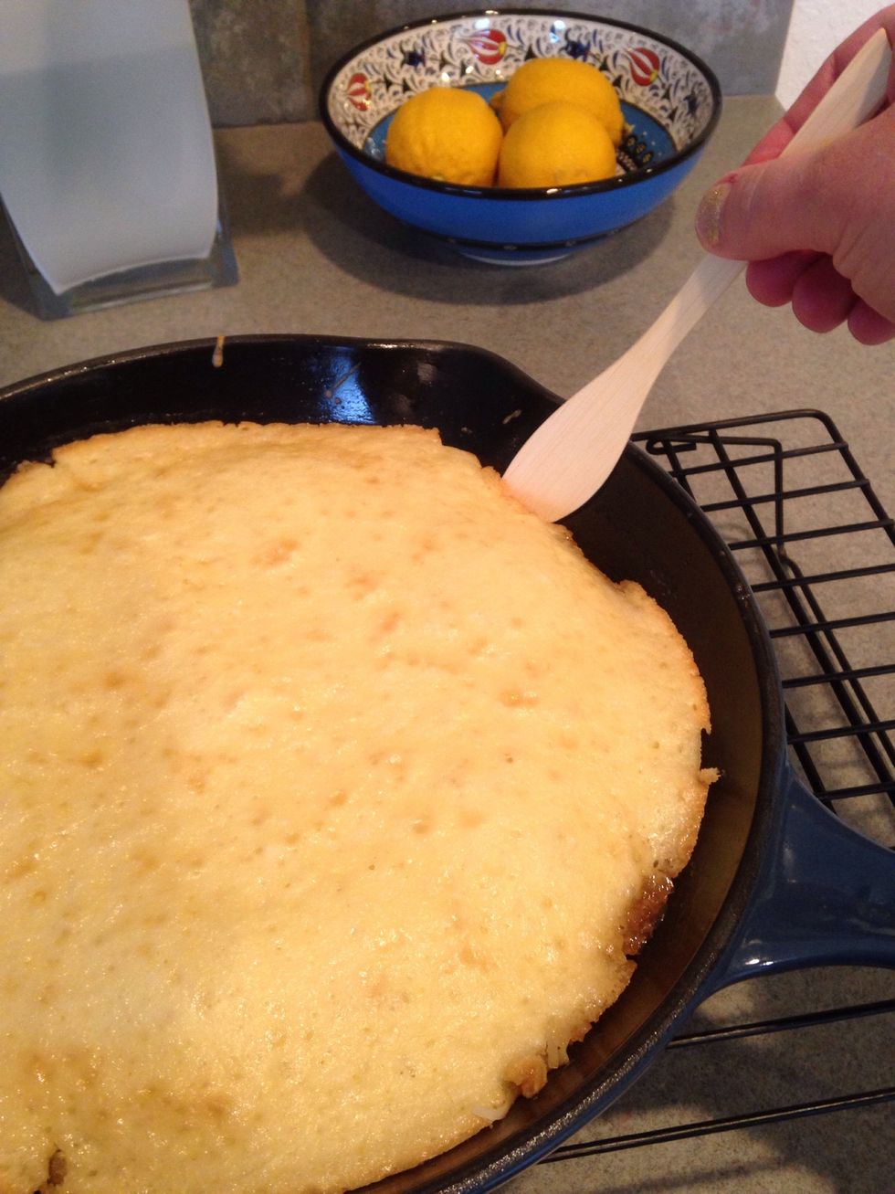 Using a non-metal utensil, gently loosen the edges.