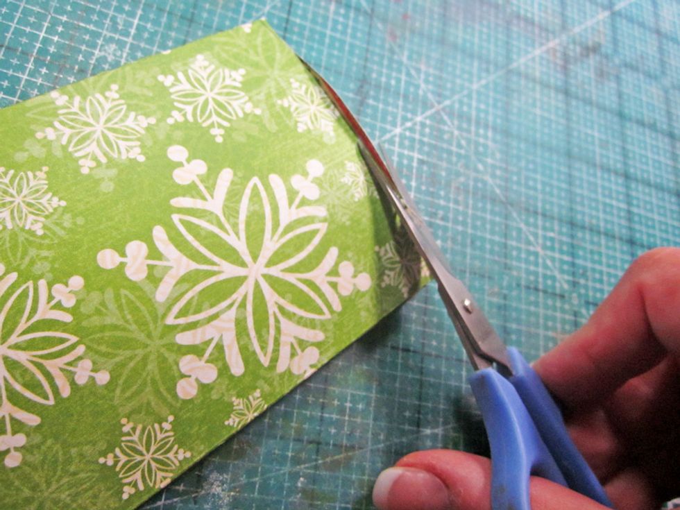 Using a pair of scissors trim any excess around the edges.