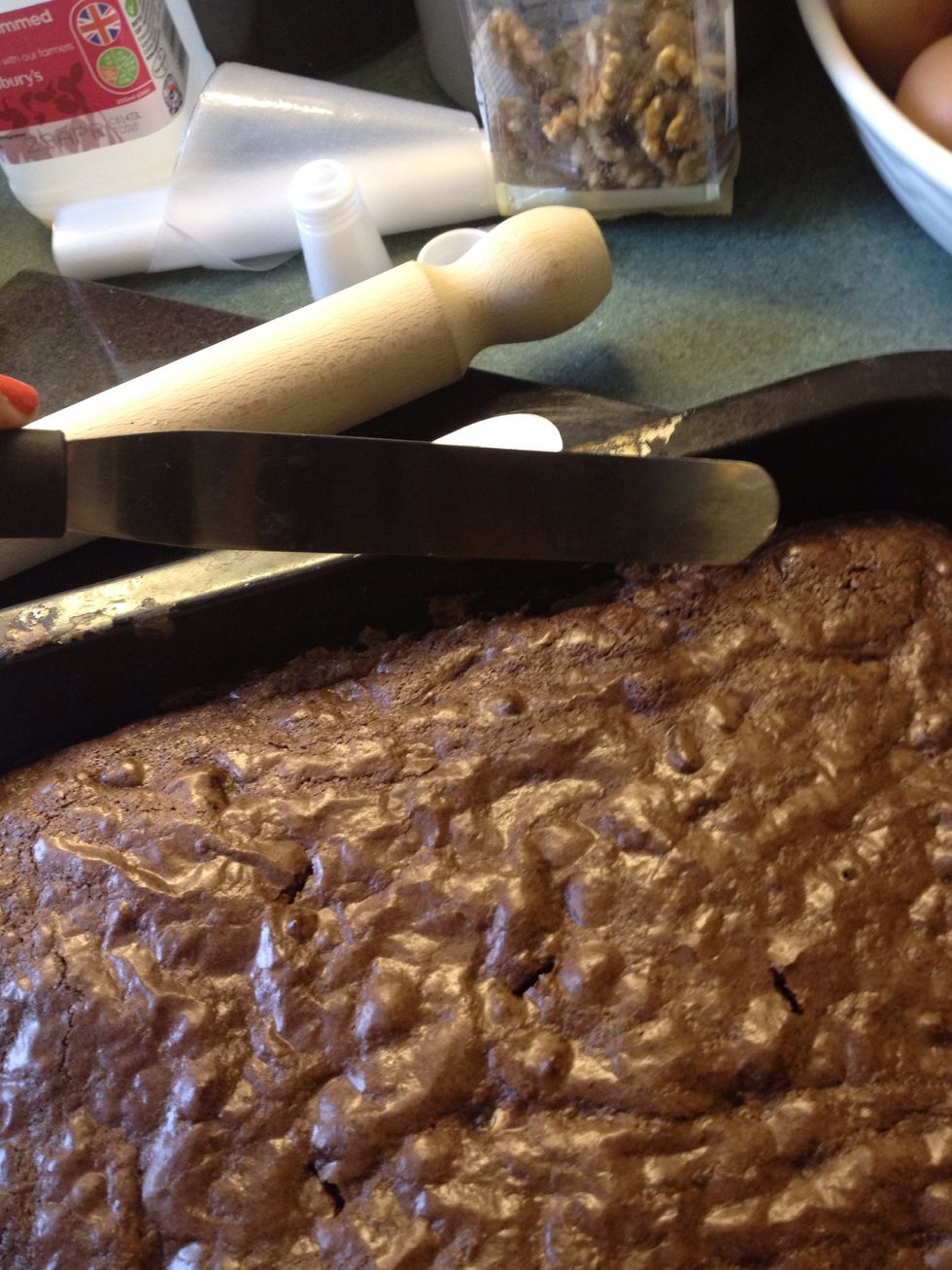 Using a pallet knife gently ease round the edges, then leave to cool completely.