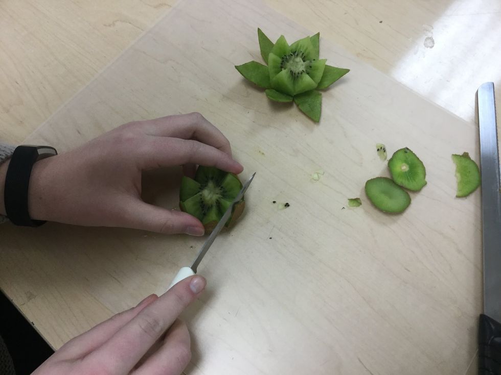Using a paring knife, start at the tip of each point and cut slowly under the skin