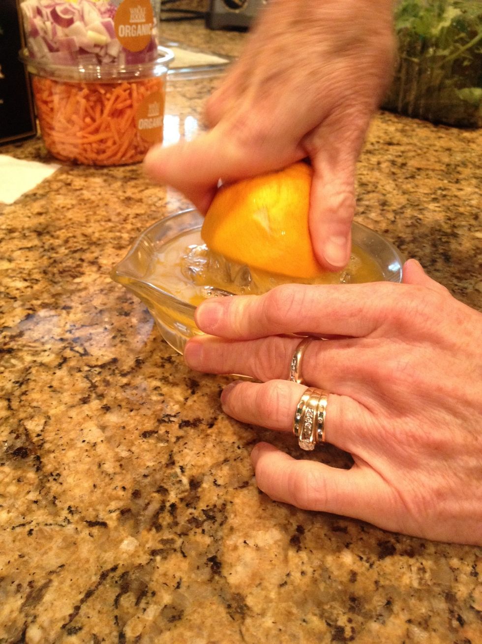 Using a reamer, juice the entire orange and lemon.
